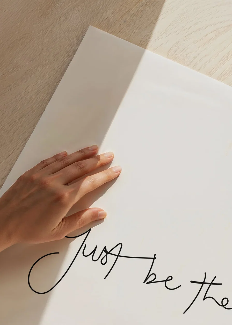 Handwritten text Just be there in black on white background-12