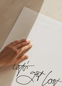 Black handwritten text 'let's get lost' on white background-3