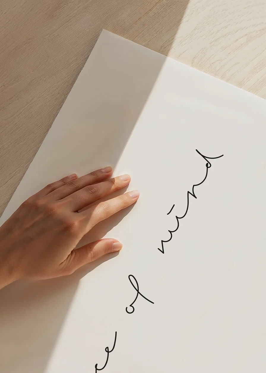 Handwritten text peace of mind in black on white background-12