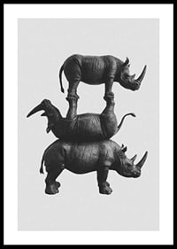 Black and white illustration of three stacked rhinos, stylish-0