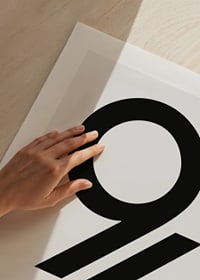 Graphic illustration of the number 96 in black on light gray-9