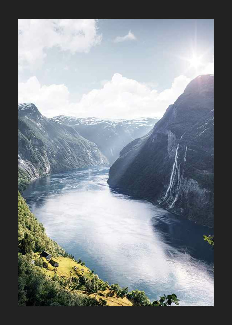 Photograph of the Geirangerfjord with high mountains and waterfalls-12