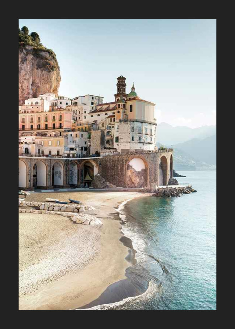 Photograph of Amalfi Coast town by cliffs and sea-12
