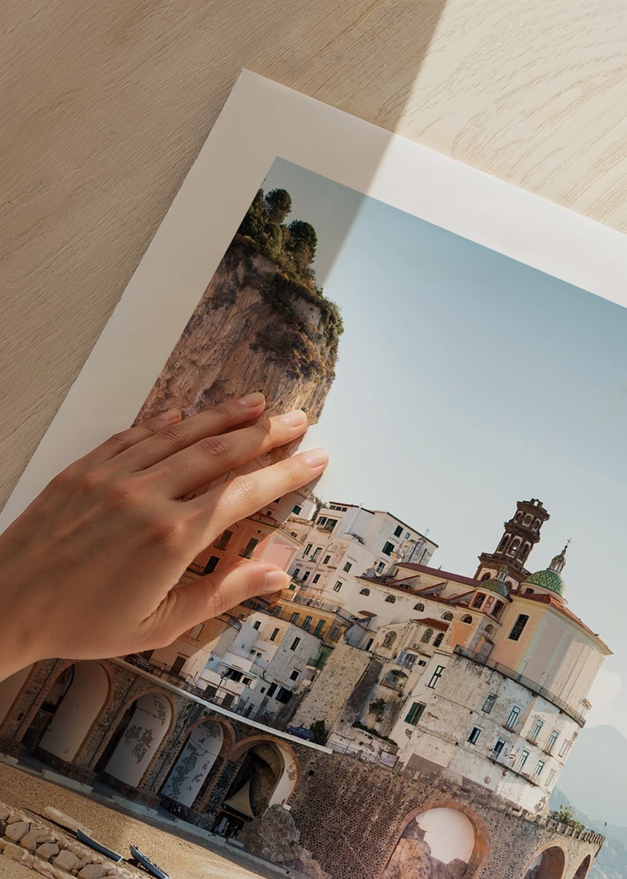 Photograph of Amalfi Coast town by cliffs and sea-12