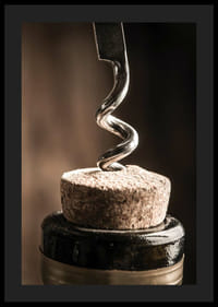 Close-up of corkscrew in wine bottle with warm tone-4