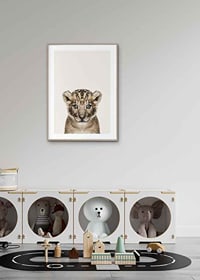 Portrait of lion cub against light beige background, photographic style-8
