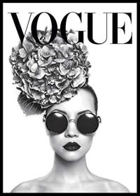 Black and white portrait of woman with big sunglasses and floral hat-0