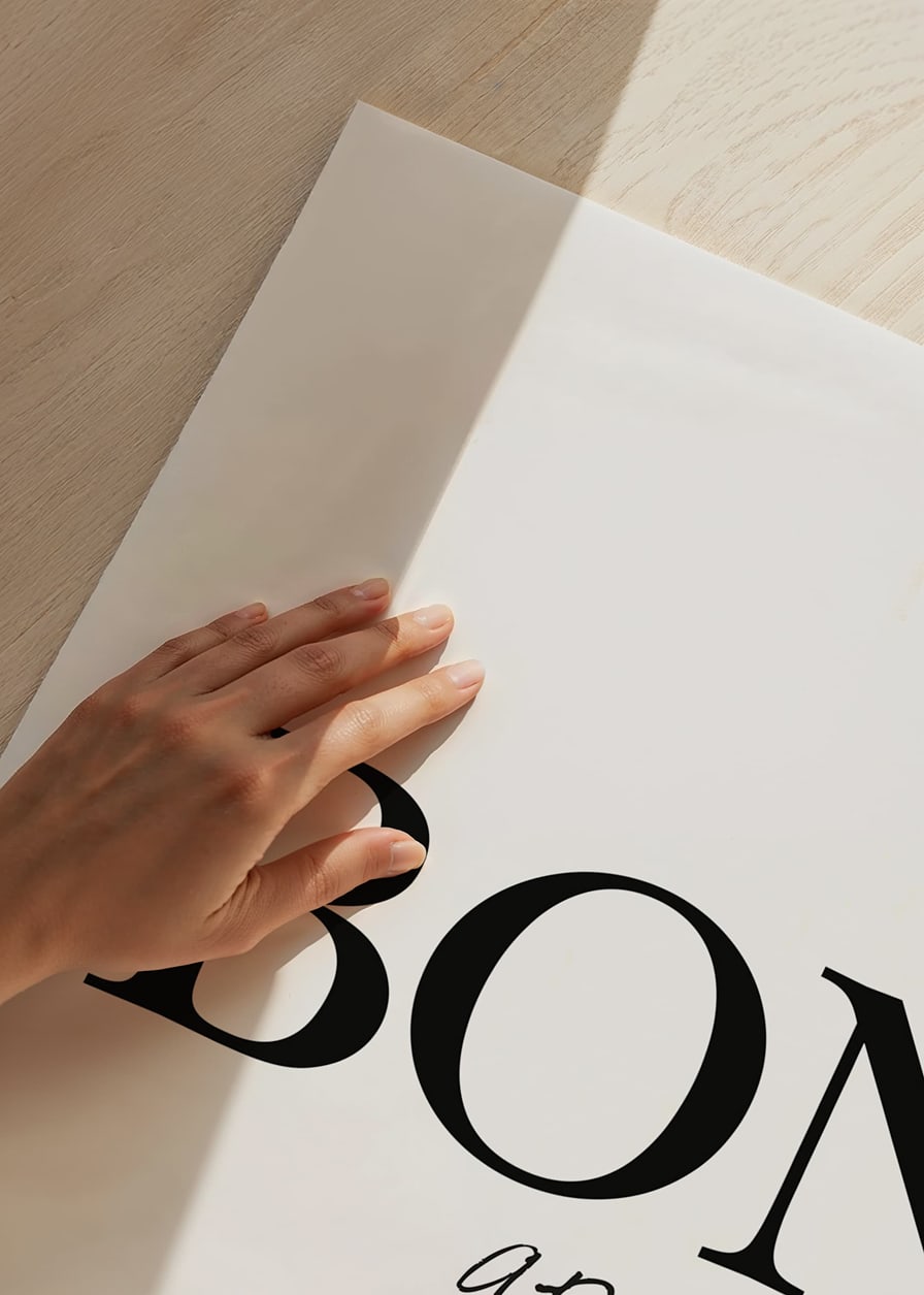 Black text Bon Appétit in two different fonts on white background-12
