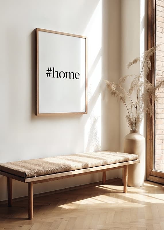 Black text with the word #home in stylish serif against a white background-12