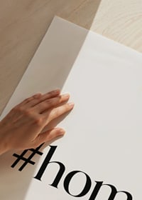 Black text with the word #home in stylish serif against a white background-3