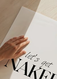 Black text with the words let’s get NAKED on a white background-3