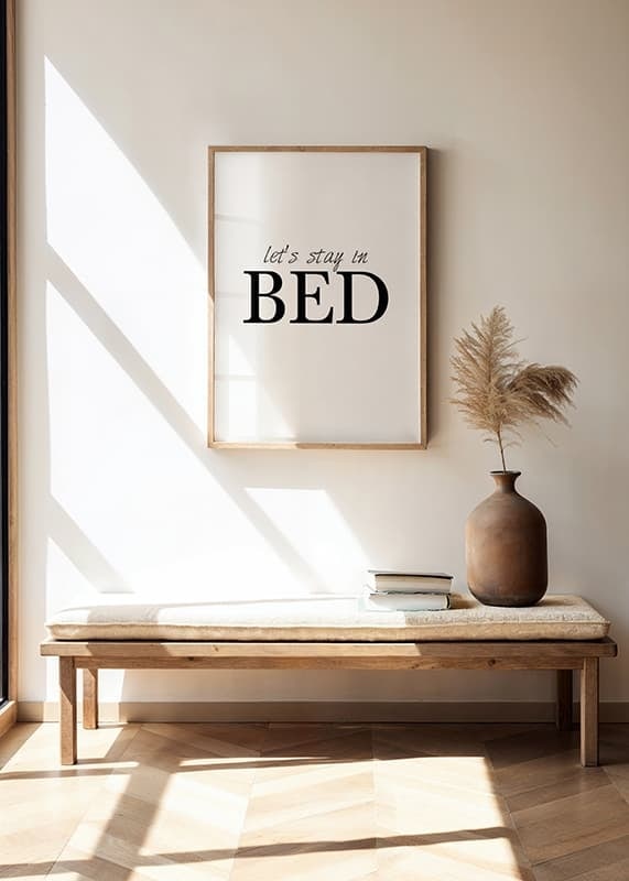 Black text with the words 'let’s stay in BED' on a white background-12