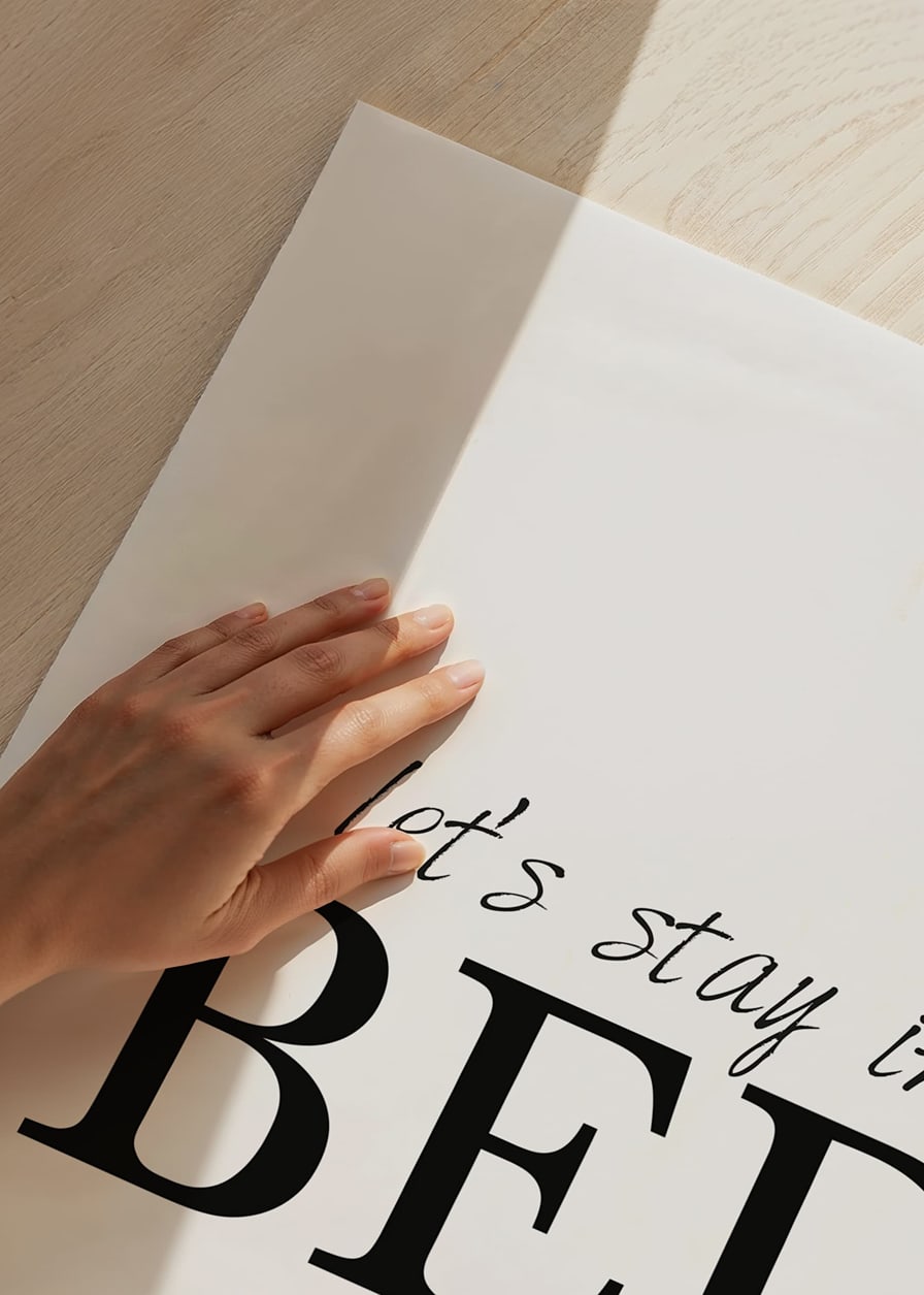 Black text with the words 'let’s stay in BED' on a white background-12