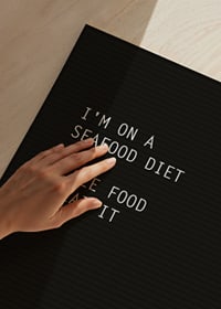 Black and white text sign with humorous quote in block letters-3