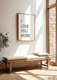 Black text with the words I LOVE YOU MORE on a white background-2