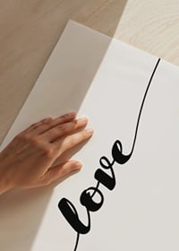 Black handwritten text love in line on white background-3