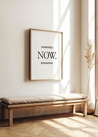 Minimalist text with the word NOW in black on white background-2