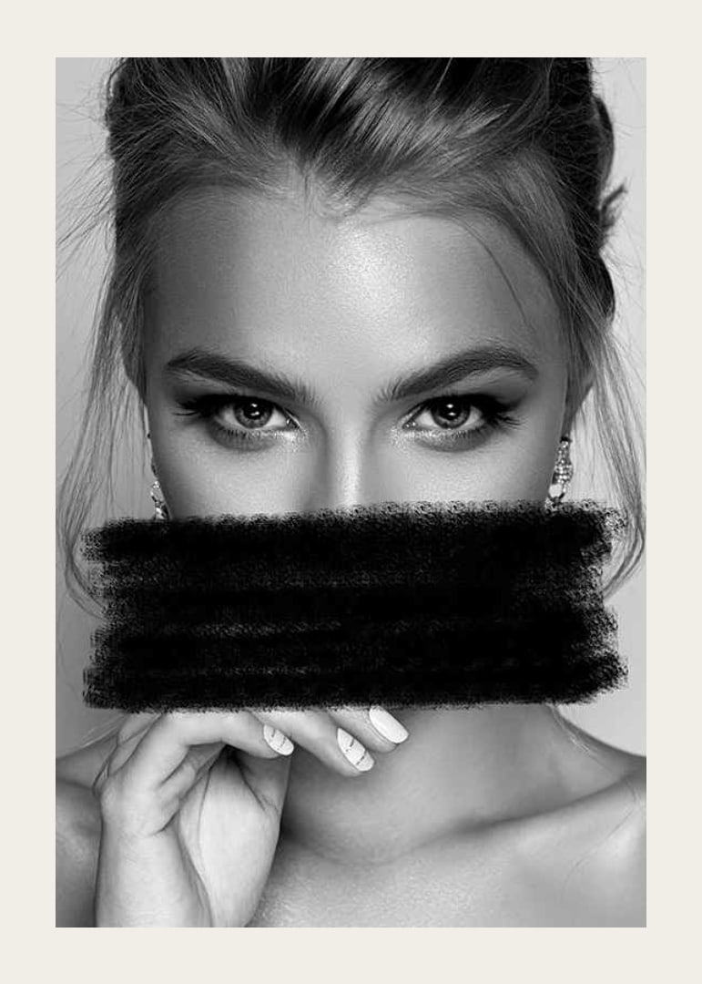 Black and white portrait of woman with black paint over mouth-12