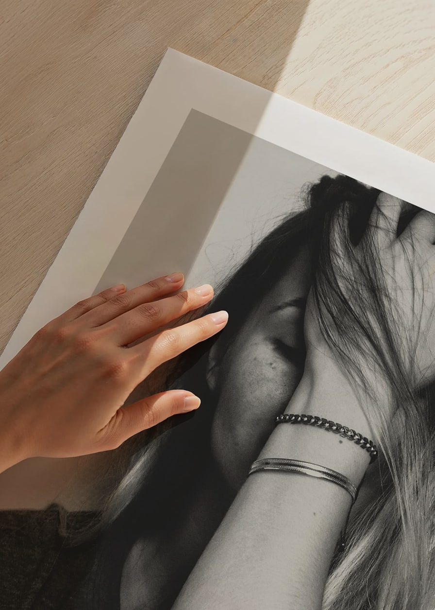 Black and white portrait of woman with hand over face-12