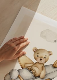 Watercolor illustration of teddy bear flying airplane among clouds-9