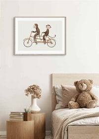 Illustration of two monkeys riding tandem bikes against light background-8