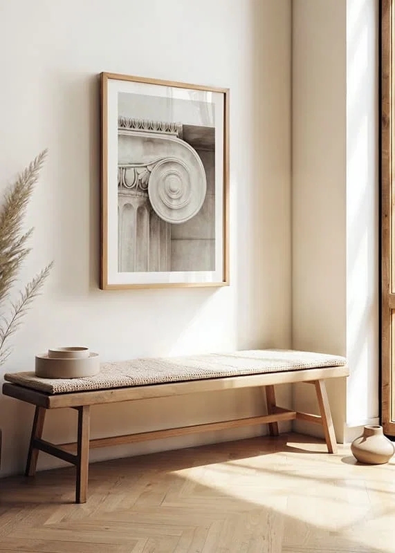 Photograph of classic column capital in light beige tones-12
