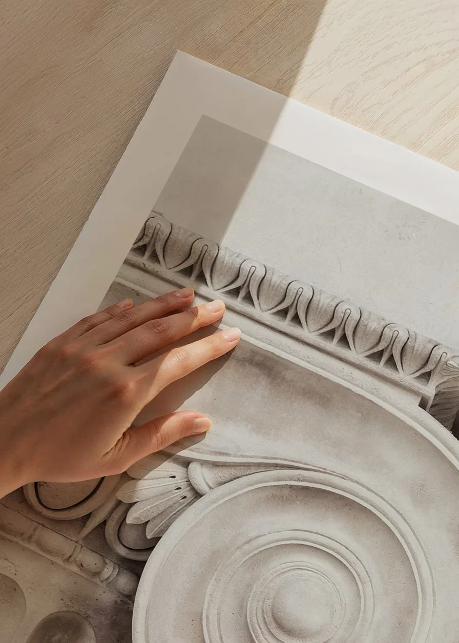 Photograph of classic column capital in light beige tones-12