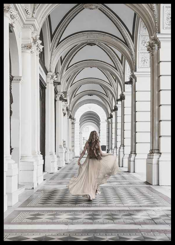 Photograph of woman in beige dress under arches-12