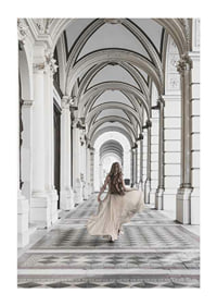 Photograph of woman in beige dress under arches-1
