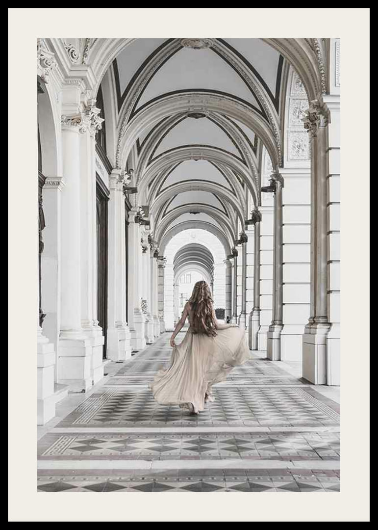 Photograph of woman in beige dress under arches-12