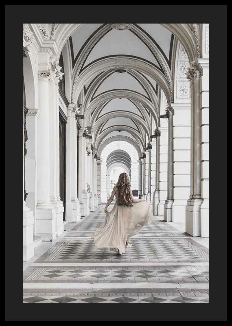 Photograph of woman in beige dress under arches-12