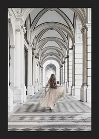 Photograph of woman in beige dress under arches-5