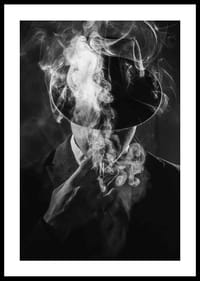 Black and white portrait of man in hat surrounded by cigarette smoke-2