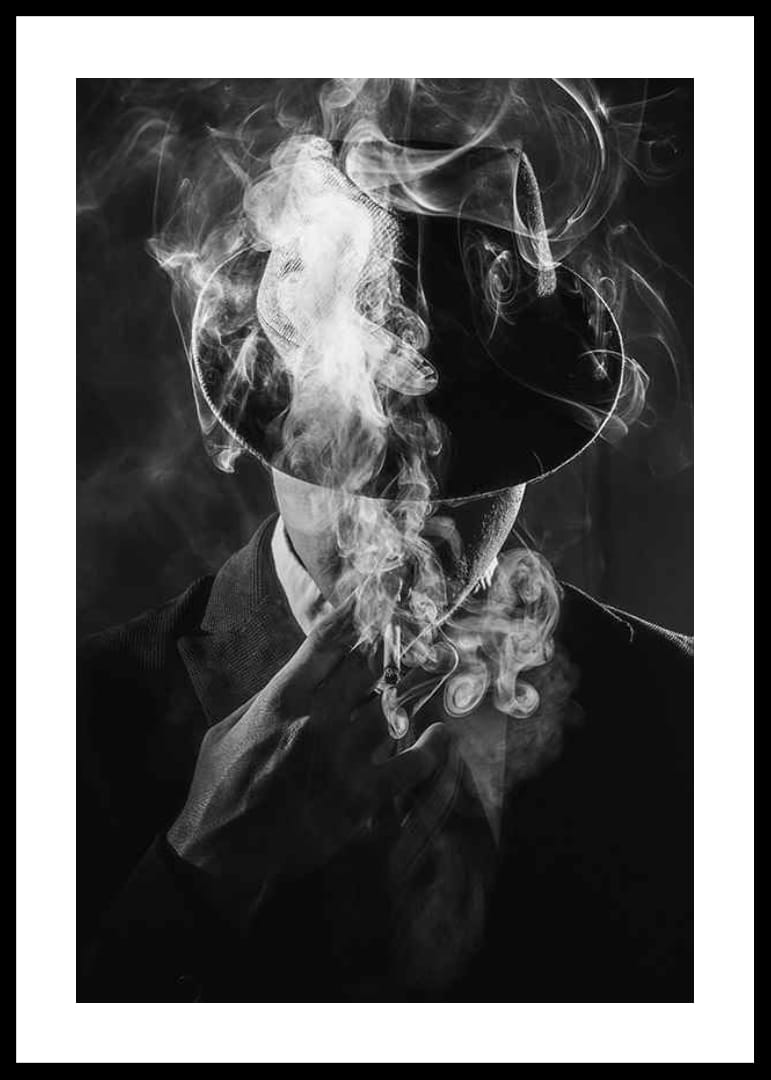 Black and white portrait of man in hat surrounded by cigarette smoke-12