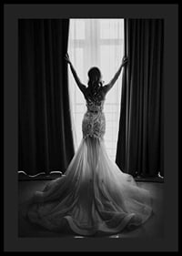 Black and white photo of woman in lace dress by open window-4