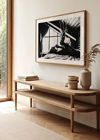 Black and white photograph of woman smoking in bed by window-8