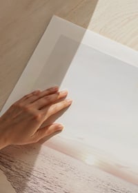 Fotografi av strand och hav i mjuka pastelltoner vid solnedgång-9