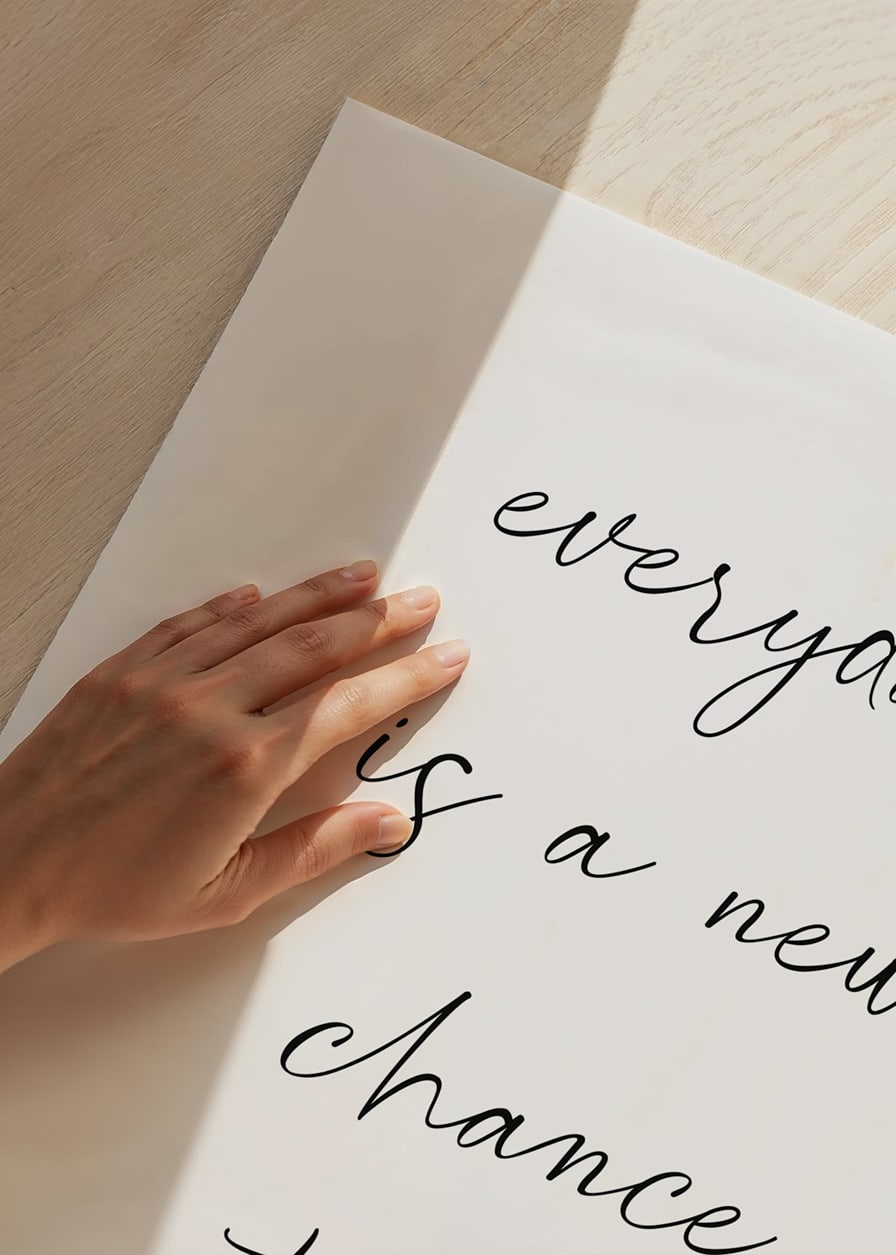 Handwritten inspirational quote in black on white background-12