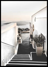 Whitewashed staircase in Santorini overlooking the sea-6