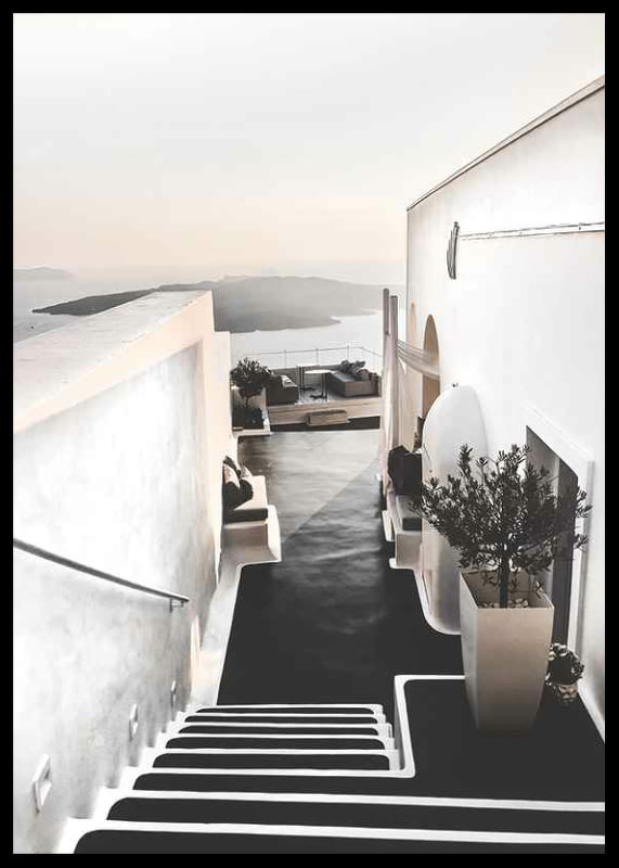 Whitewashed staircase in Santorini overlooking the sea-12