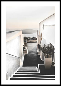 Whitewashed staircase in Santorini overlooking the sea-0