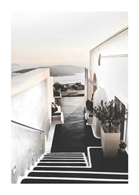 Whitewashed staircase in Santorini overlooking the sea-1