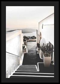 Whitewashed staircase in Santorini overlooking the sea-4
