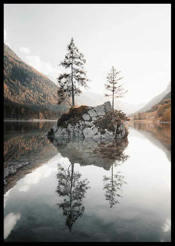 Photograph of small island with trees in mirror-like lake, autumn colors-12
