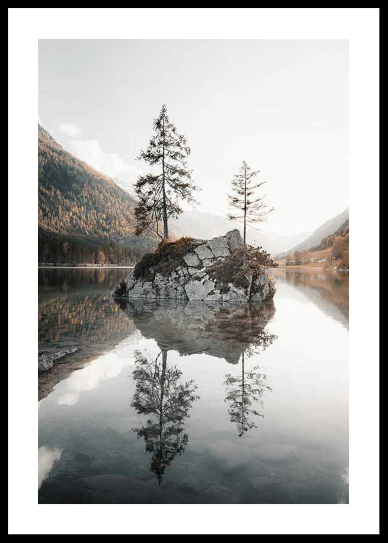 Photograph of small island with trees in mirror-like lake, autumn colors-12