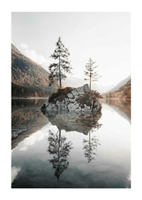 Photograph of small island with trees in mirror-like lake, autumn colors-1