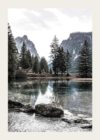 Photograph of alpine landscape with fir trees and clear lake-3