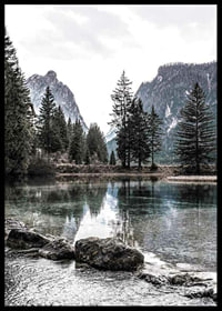 Photograph of alpine landscape with fir trees and clear lake-6