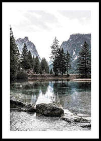 Photograph of alpine landscape with fir trees and clear lake-0