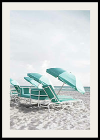 Photograph of turquoise umbrellas and sun loungers on beach-2